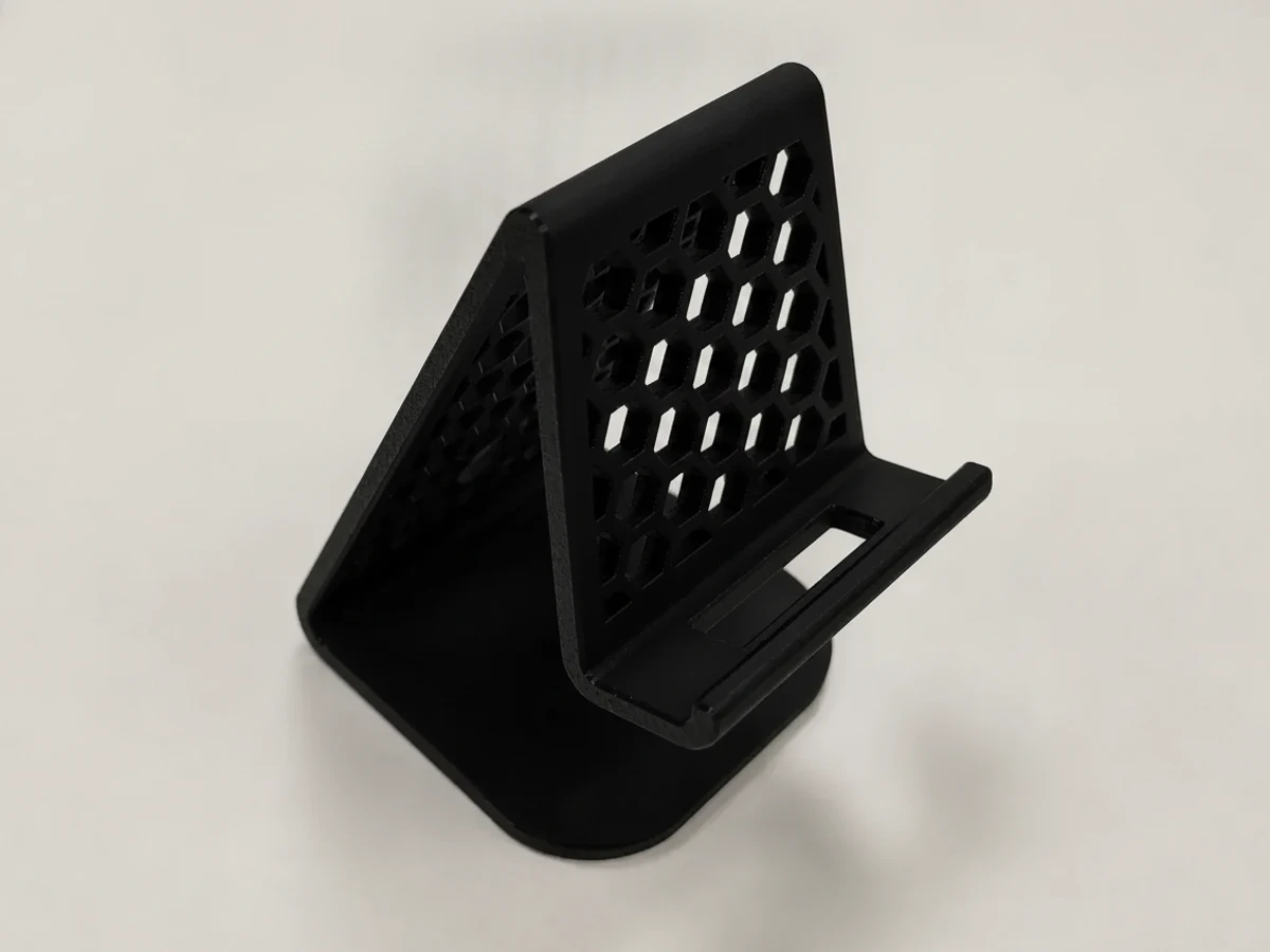 Soporte para celular con patrón hexagonal